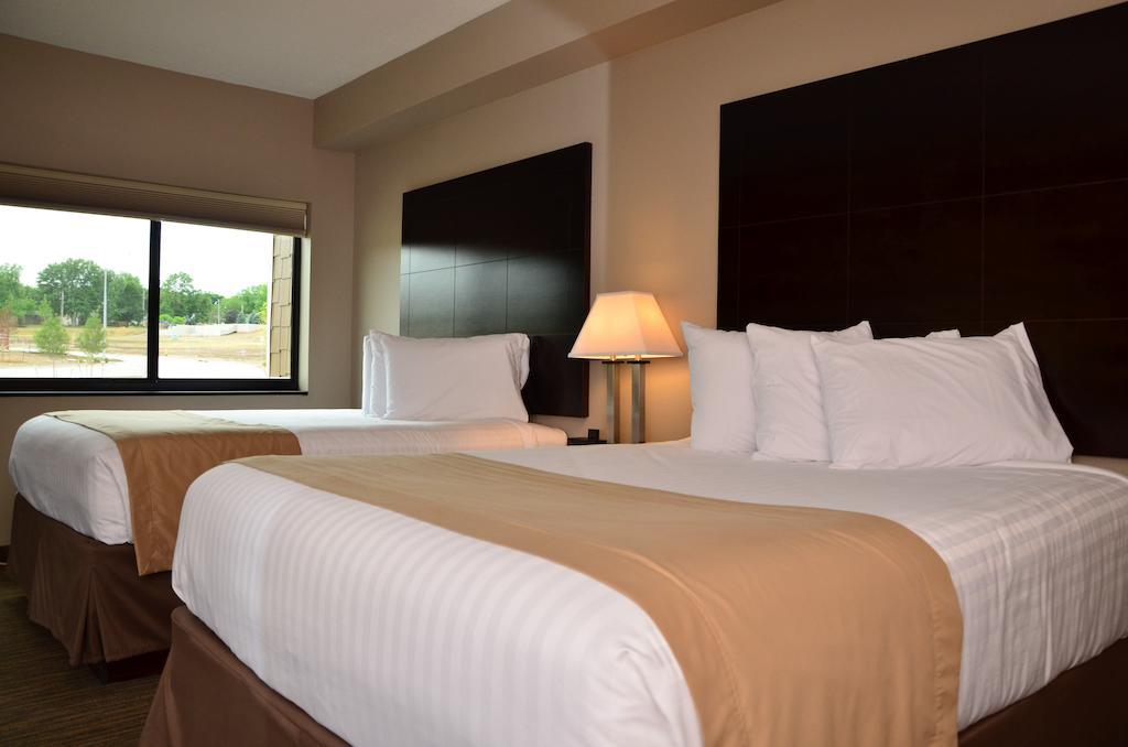 Qube Hotel - Polk City Habitación foto